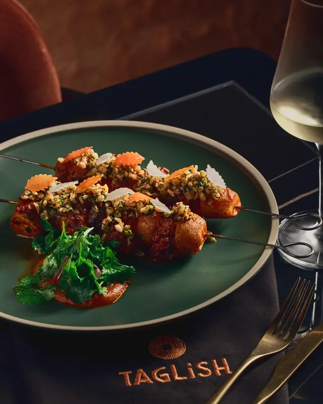 Grilled octopus skewer with pili gremolata